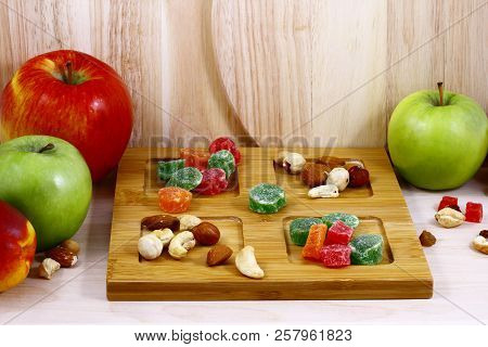 Beautifully Laid Out Fresh Summer Fruits On A Background Of Cutting Boards