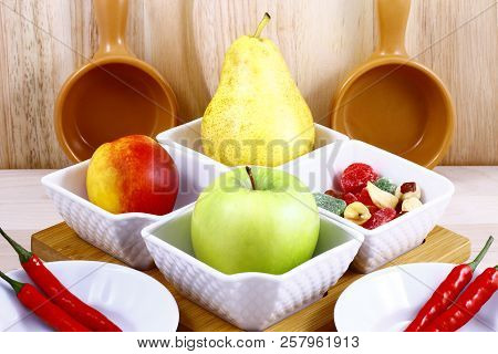 Beautifully Laid Out Fresh Summer Fruits On A Background Of Cutting Boards
