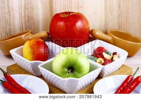 Beautifully Laid Out Fresh Summer Fruits On A Background Of Cutting Boards