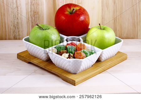 Beautifully Laid Out Fresh Summer Fruits On A Background Of Cutting Boards