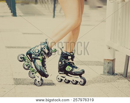 Woman Legs Wearing Roller Skates