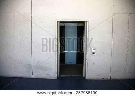 elevator. grungy old elevator. freight elevator. 