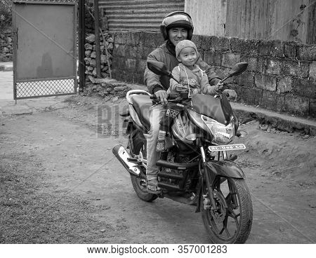 Father And Son On Motorcycle