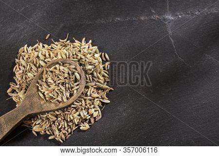 Dried Fennel Seeds In The Wooden Spoon - Foeniculum Vulgare