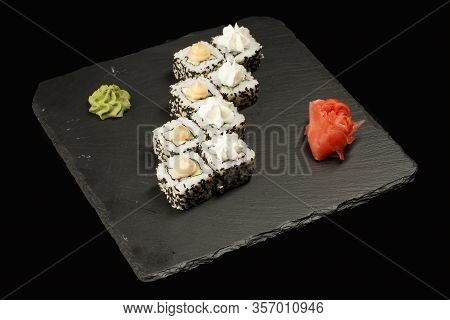 Various Sushi, Rolls On A Black Background With Reflection. Especially For Cafes And Restaurants On 