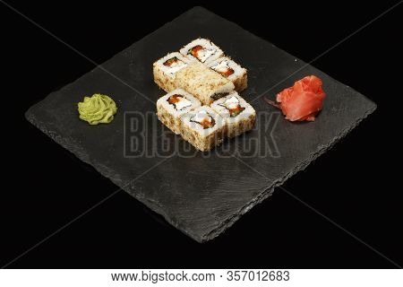 Various Sushi, Rolls On A Black Background With Reflection. Especially For Cafes And Restaurants On 
