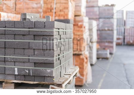 Construction Materials. Building Materials For Construction Of Residential Complex. Pile Of White Br