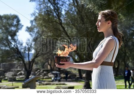 Olympia, Greece -  March 12, 2020: Olympic Flame Handover Ceremony For The Tokyo 2020 Summer Olympic
