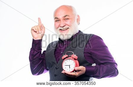 Mature Man With Beard Clock Show Time. Time And Age. Timekeeping. Retirement. Watchmaker Or Watch Re