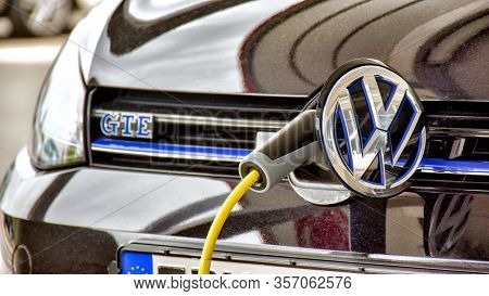 Herzogenaurach, Germany - June 23, 2018: A Volkswagen Golf Gte Is Charged At A Charging Station. The