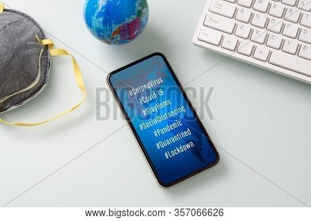 Coronavirus Or Covid-19 Outbreak Social Media Hashtag Background Concept. Mockup Mobile Phone With C