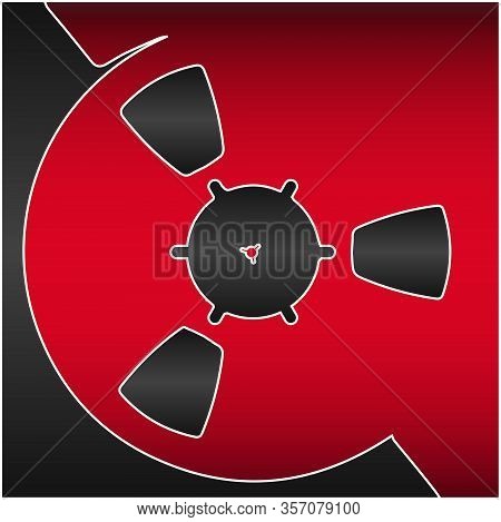 An Abstract Reel Of Audi Recording Tape In Red And Black