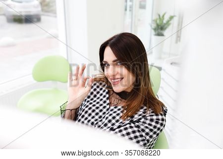 Satisfied Dentistry Patient Woman Shows Okay Gesture