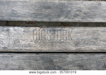 The Old Gray Wooden Planks Are Arranged Horizontally. Fragment Of An Old Shop. Wooden Background Unw