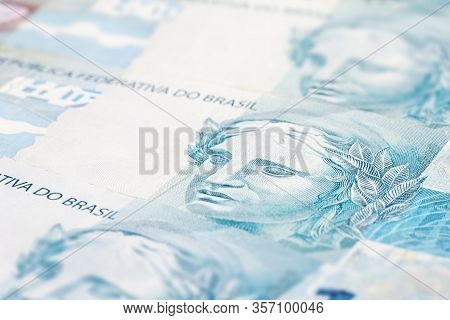 Details Of 100 Reais Banknote From Brazil, With Selective Focus, Background Image For Monetary Conce