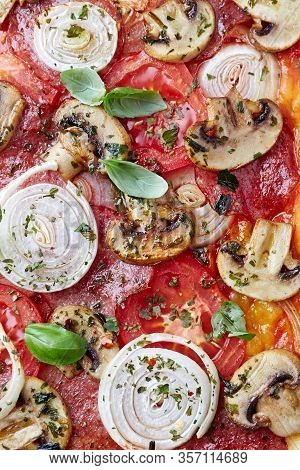Pizza With Salami, Tomatoes, White Onion, Champignon Mushrooms And Fresh Basil. Close Up. Top View.