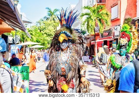 Playa Del Carmen, Mexico - Dec. 26, 2019: Men Dressed In Traditional Indigenous Mayan Warrior Costum