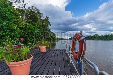 River Deck View Of The Suriname River In The Amazon