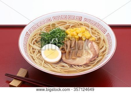 Japanese Soy Sauce Ramen Noodles In A Bowl With Chopsticks On Tray