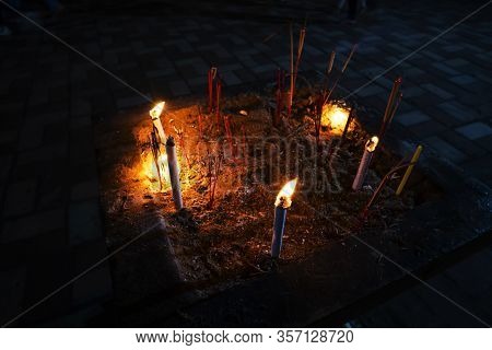 Candle Lit Tradition In Temple Of Thailand