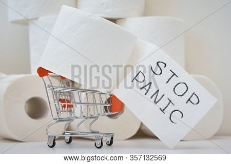 Consumer Buying Panic About Coronavirus Covid-19 Concept. Toilet Paper Roll In Shopping Trolley With