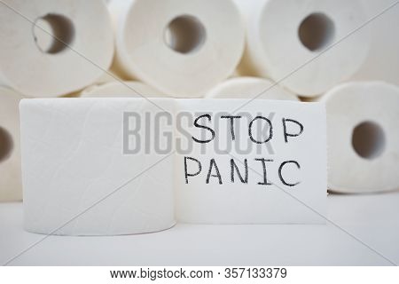 Consumer Buying Panic About Coronavirus Covid-19 Concept. Toilet Paper Rolls With Inscription Stop P
