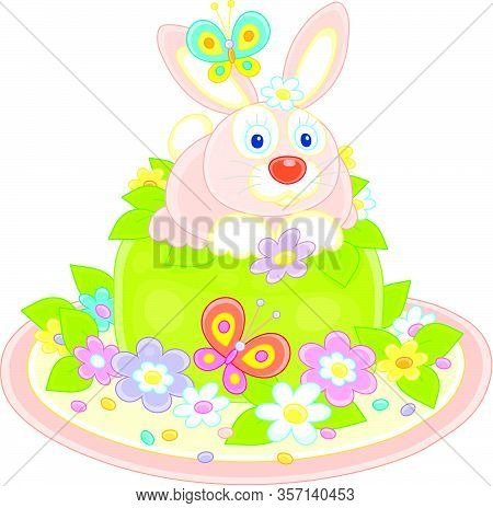 Fancy Easter Toy Hat Made Like A Sweet Holiday Cake With A Cute Pink Bunny, Colorful Flowers And Fli