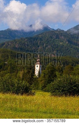 Bell Tower Of St John The Baptist Church In Bohinj, Slovenia