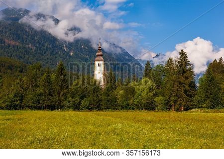 Bell Tower Of St John The Baptist Church In Bohinj, Slovenia