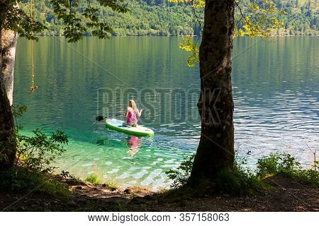 Bohinj, Slovenia - August, 01: Girl Kayaking In The Scenic Bohinj Lake On August 01, 2019