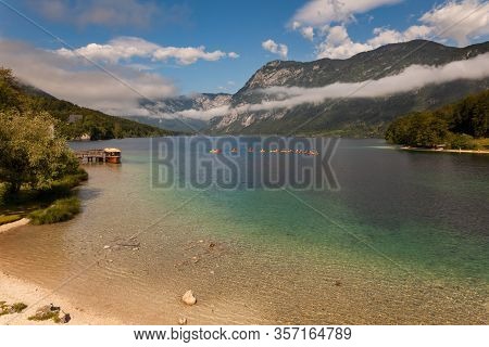 People Kayaking In The Bohinj Lake, Slovenia