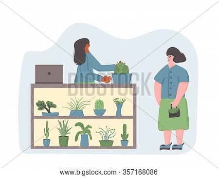 Indoor Plants Shop. Sale Of Potted House Plants. Seller Houseplants With Her Client. Small Business 
