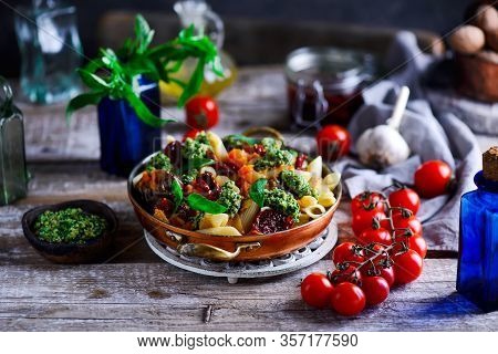 Pasta With Grilled Eggplant, Smoky Tomato Sauce And Basil Walnut Pistou. Style Vintage.selective Foc
