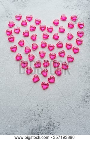 Big Pink Heart Upright On A Concrete White Background