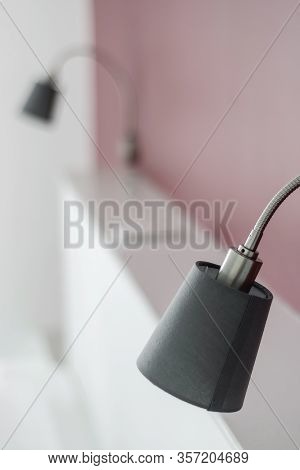 Modern Design Bed Lamps Detail In Contemporary Bedroom Interior At Daytime