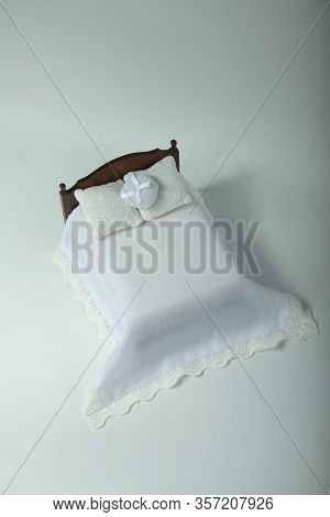 Light Covers On Double Bed Isolated On Light Background Flat Lay. Image Contains Copy Space