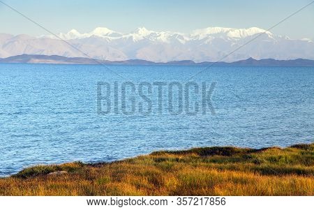 Karakul Lake And Pamir Range In Tajikistan. Landscape Around Pamir Highway M41 International Road