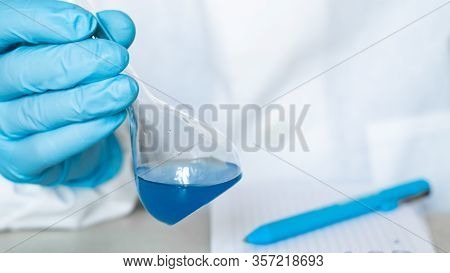 Chemist Or Pharmacologist Examines Samples Of Substances In A Laboratory