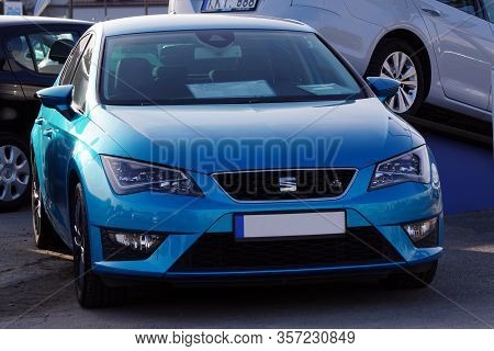 Krakow, Poland 03.15.2020: Blue Seat Leon Fr In The Parking Lot Of The Commission Car Center Among O