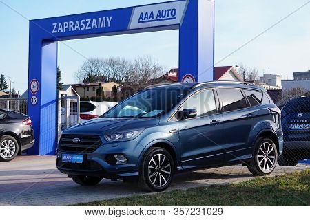Krakow, Poland 03.15.2020: Blue Ford Kuga In The Parking Lot Of The Commission Car Center Among Othe