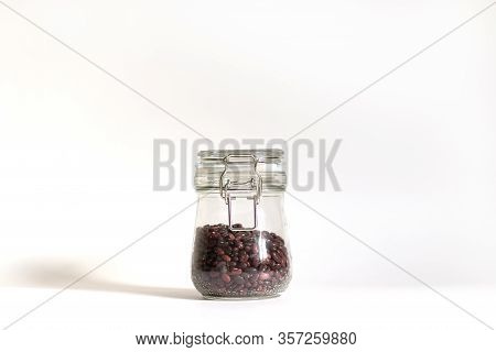 Red Beans Are Tightly Closed In A Glass Bowl. Food Stocks For Future Use. Safe And Environmentally F