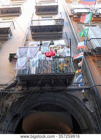Colored Flags Hung Between The Terraces Of The Houses Of The Spanish Quarters In Naples