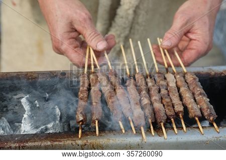 Cooking  Lamb And Mutton Skewers Called Arrosticini In Italian A