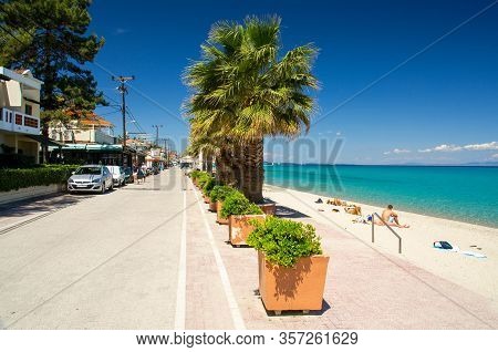 Pefkohori, Greece - May 16, 2016: Embankment, Promenade And Sandy Beach Of Town Pefkohori, Halkidiki