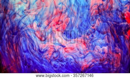 Abstract Purple Ink Dye, Mixing On Water, Closeup Macro