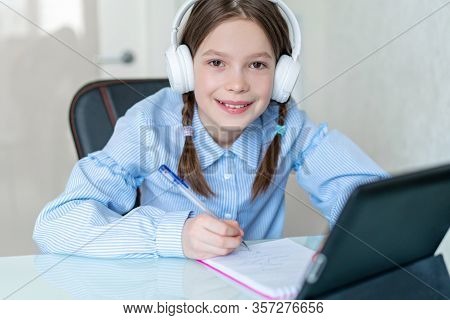 Young Girl Learn By Tablet At Home. Distance Learning In Quarantine. Isolation