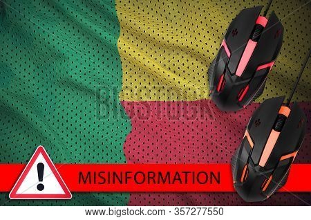 Benin Flag And Two Computer Mouses. Misinformation During Coronavirus Or 2019-ncov Virus Concept