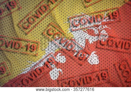 Bhutan Flag And Many Red Covid-19 Stamps. Coronavirus Or 2019-ncov Virus Concept
