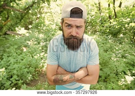 Style Designed For A Brutal. Bearded Man With Brutal Look Keeping Arms Crossed. Brutal Caucasian Guy
