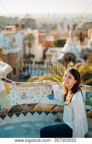 Young Smiling Female Tourist Spending Vacation In Barcelona,catalonia,spain.traveling To Europe.pano
